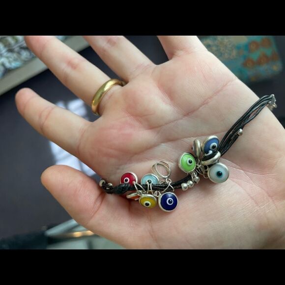 Beautiful pleather bracelet with colored evil eye pendants - Picture 4 of 5